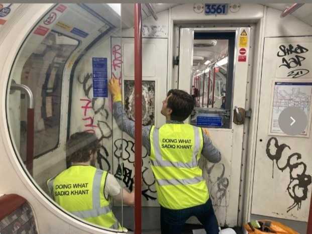 Team cleaning tube station